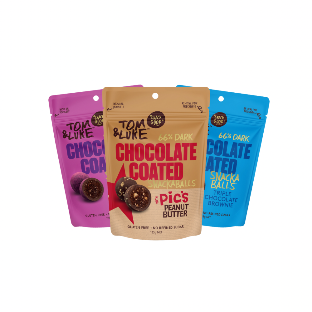 Three Tom & Luke Low Carb Chocolate coated SnackaBalls. Pics Peanut Butter, Dark Forest and Triple Chocolate Brownie flavour. Delicious and Nutritious snack made in New Zealand. 