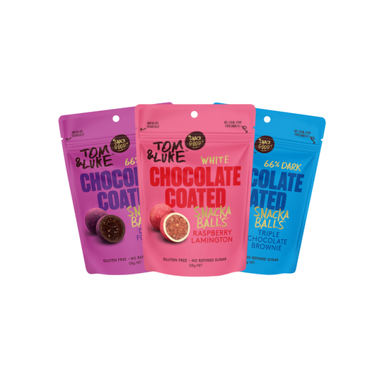Three Tom & Luke Low Carb Chocolate coated SnackaBalls. Raspberry Lamington, Dark Forest and Triple Chocolate Brownie flavour. Delicious and Nutritious snack made in New Zealand. 