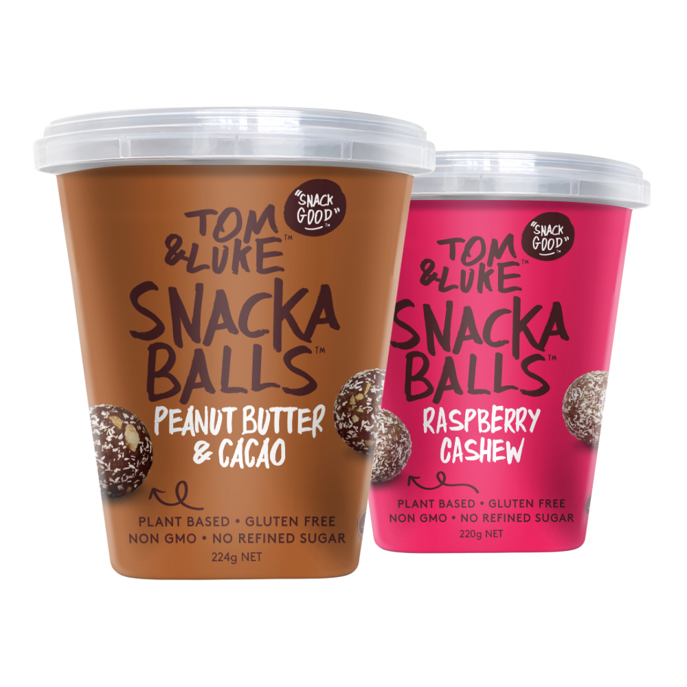 Two containers of Tom & Luke Snacka Balls, one peanut butter and cacao, one raspberry cashew, on a white background. Delicious and nutritious healthy snacks from New Zealand. 